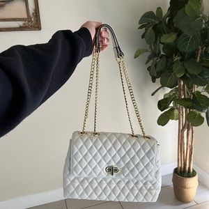 E.R Roulour: White Quilted bag W/ Gold accents